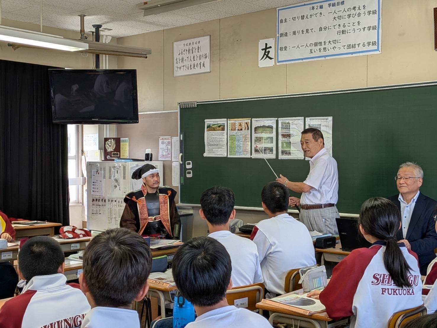 新宮中学校で講演を行なう道雪会のみなさん